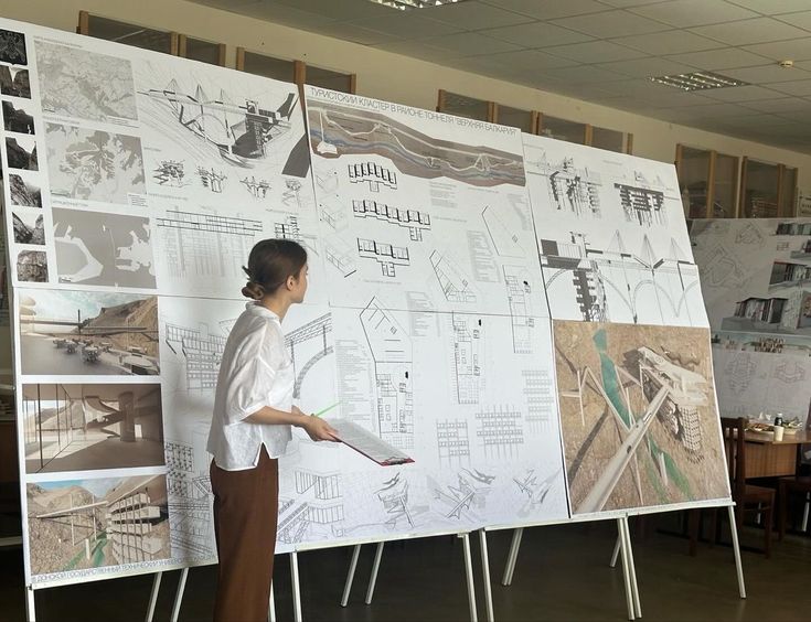 La Femme Certaine — Lea, architect, presenting plans